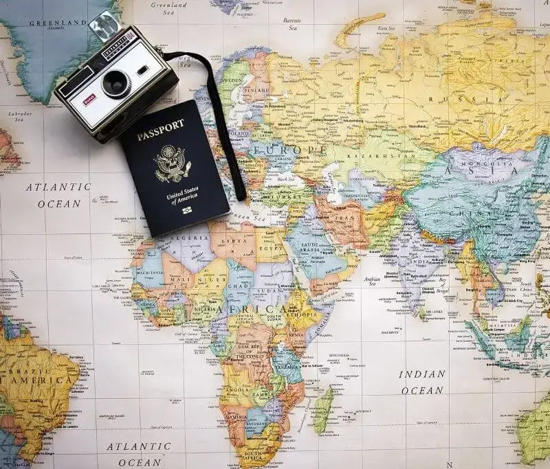 A camera, map and passport - useful tools in deciding the answer to the questions "should I move to Germany with my family?"