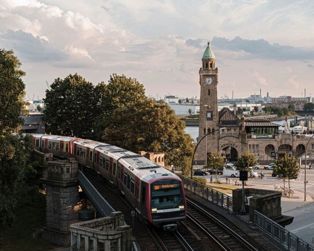 The old town of Freiburg with a train in the foreground, one of the best cities for expat families in Germany