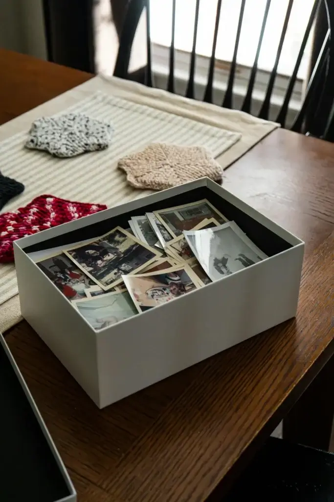 A photobox filled with memories from the family's home before relocating internationally.